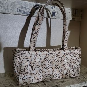 Harveys seatbelt purse retro boomerang